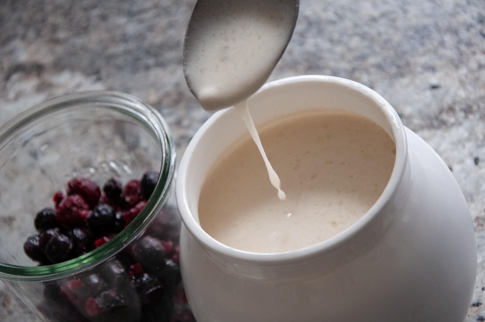 Picture of a jar of homemade non-dairy yogurt perfect to go with JuNula just nuts granola, gluten free, grain free, low carb granola