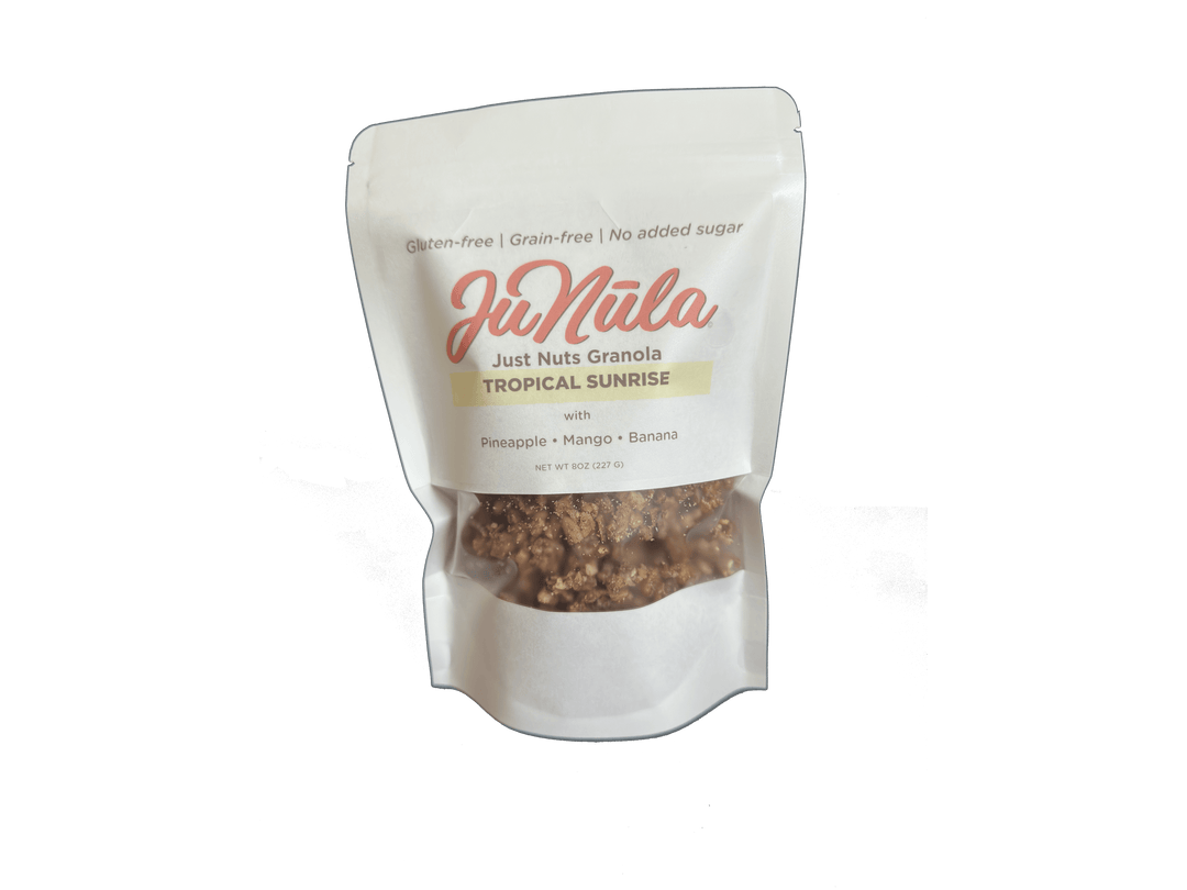 8oz package of Tropical Sunrise granola from the front
